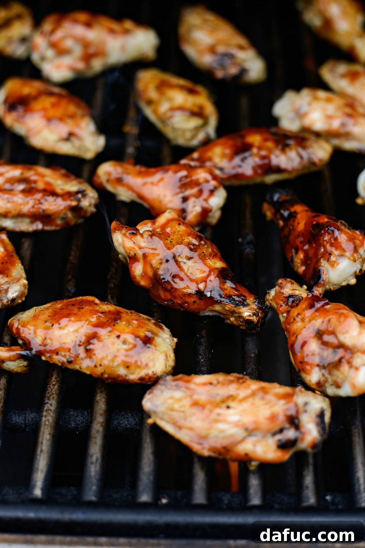 Sweet & Smoky Cherry Chipotle Wings 15 Repeating the basting and turning process to caramelize the chicken wings