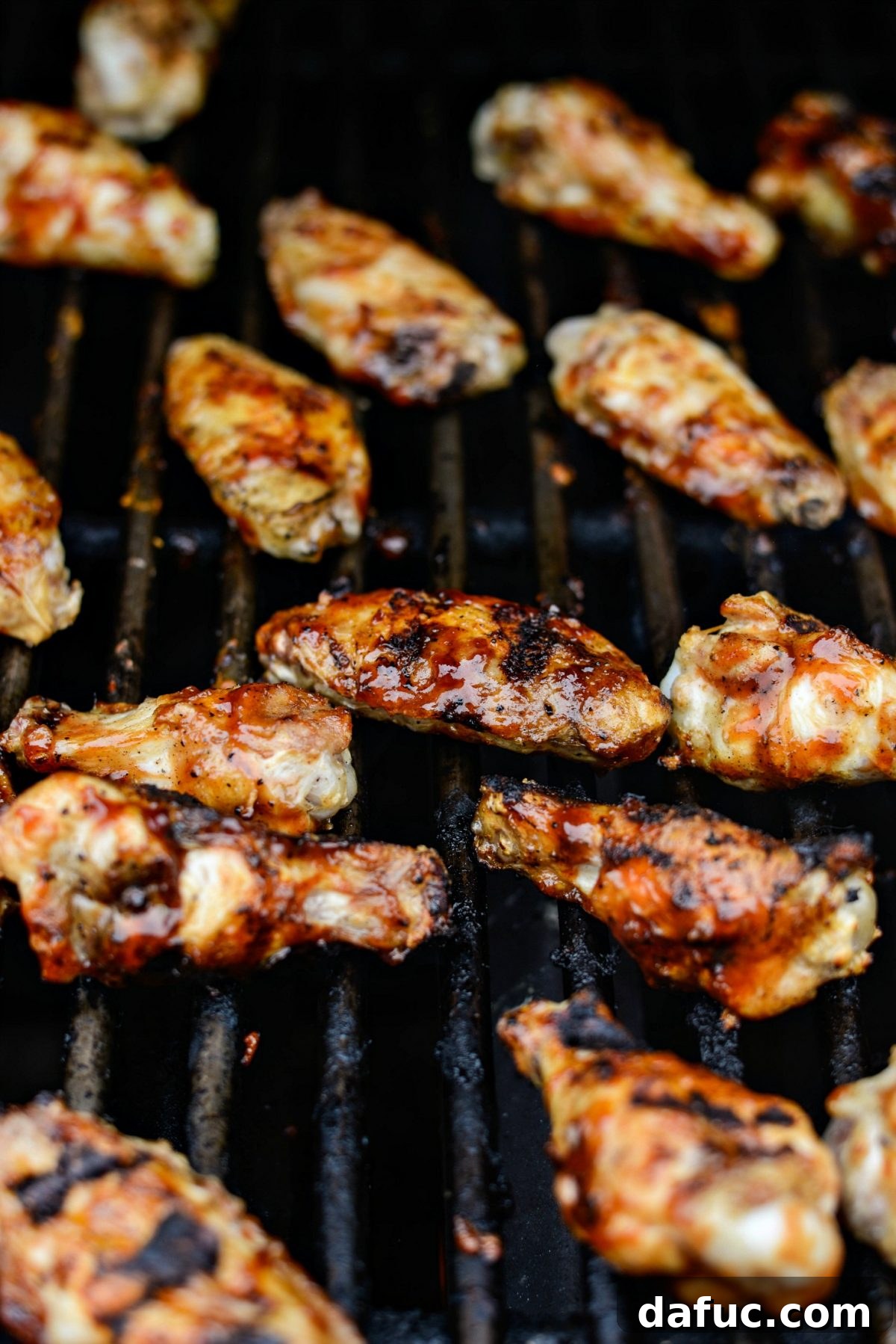Sweet & Smoky Cherry Chipotle Wings 16 Perfectly sticky and caramelized grilled chicken wings