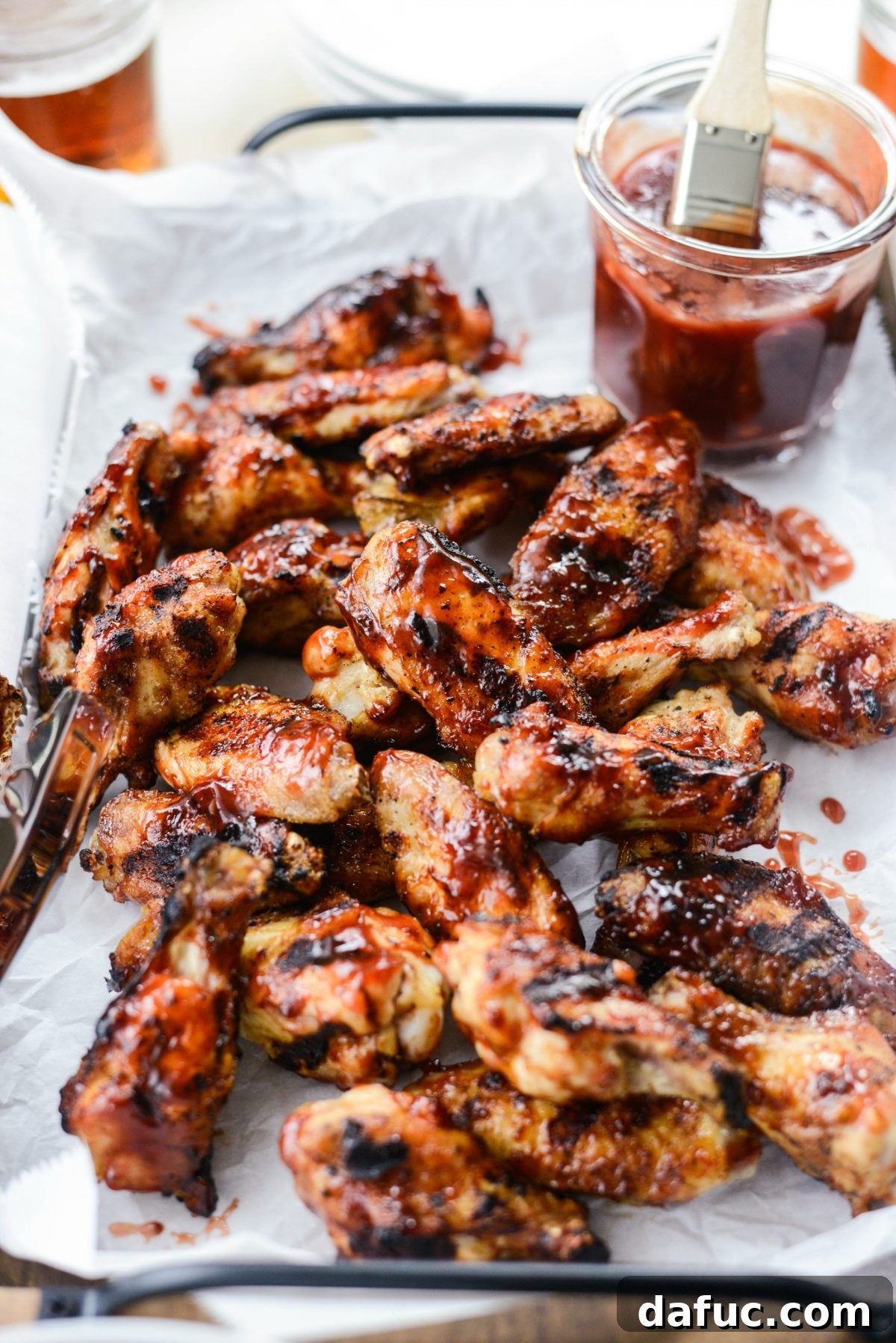 Sweet & Smoky Cherry Chipotle Wings 19 A generous serving of Grilled Cherry Chipotle Chicken Wings arranged on a plate