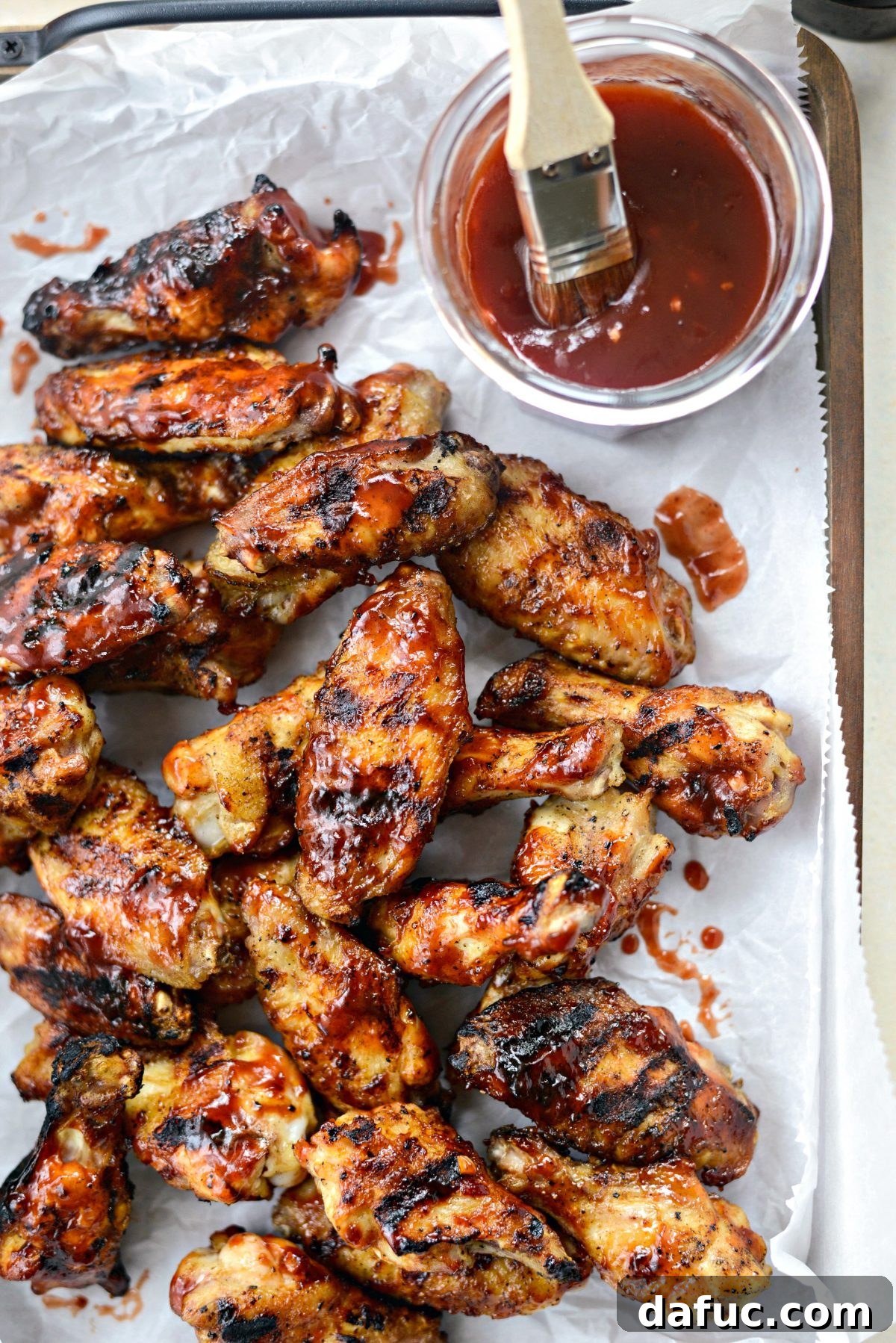Sweet & Smoky Cherry Chipotle Wings 21 Final shot of a plate of Grilled Cherry Chipotle Chicken Wings, enticing and delicious