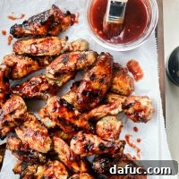 Sweet & Smoky Cherry Chipotle Wings 22 Grilled Cherry Chipotle Chicken Wings l SimplyScratch.com #grilled #wings #cookout #appetizer #homemade #barbecuesauce