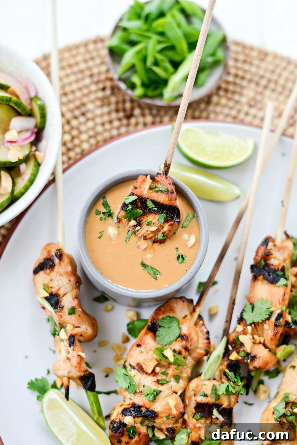 Thai Chicken Satay Skewers with Creamy Peanut Sauce 3 Grilled Chicken Satay skewers with a rich Thai Peanut Sauce
