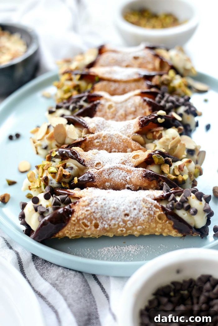 Tray of beautiful homemade Italian cannolis, ready to serve.