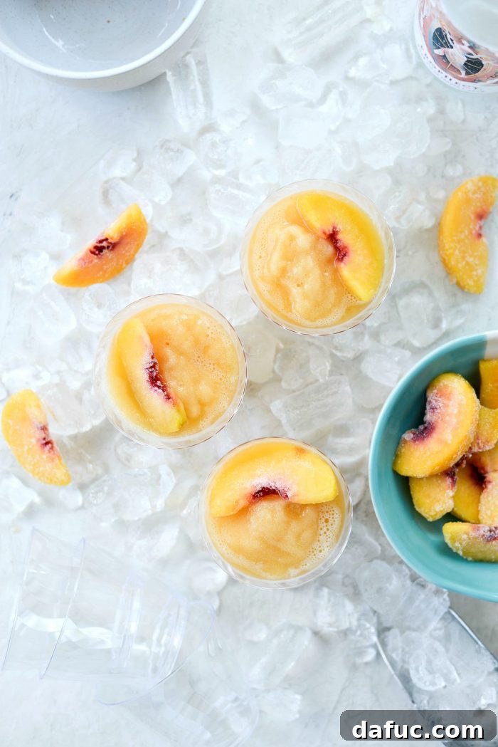 Blushing Peach Dream 11 A close-up view of the perfectly blended Peach Frosé, showcasing its smooth texture and inviting color.