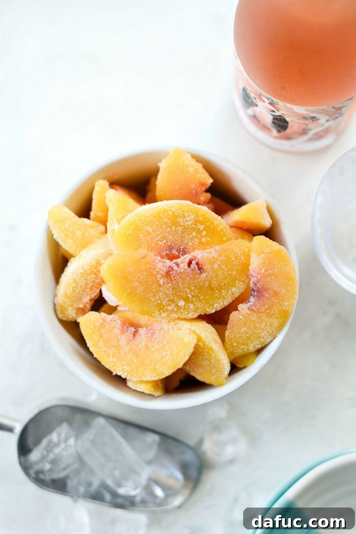 Blushing Peach Dream 6 Adding ice to the blender for the Peach Frosé recipe.