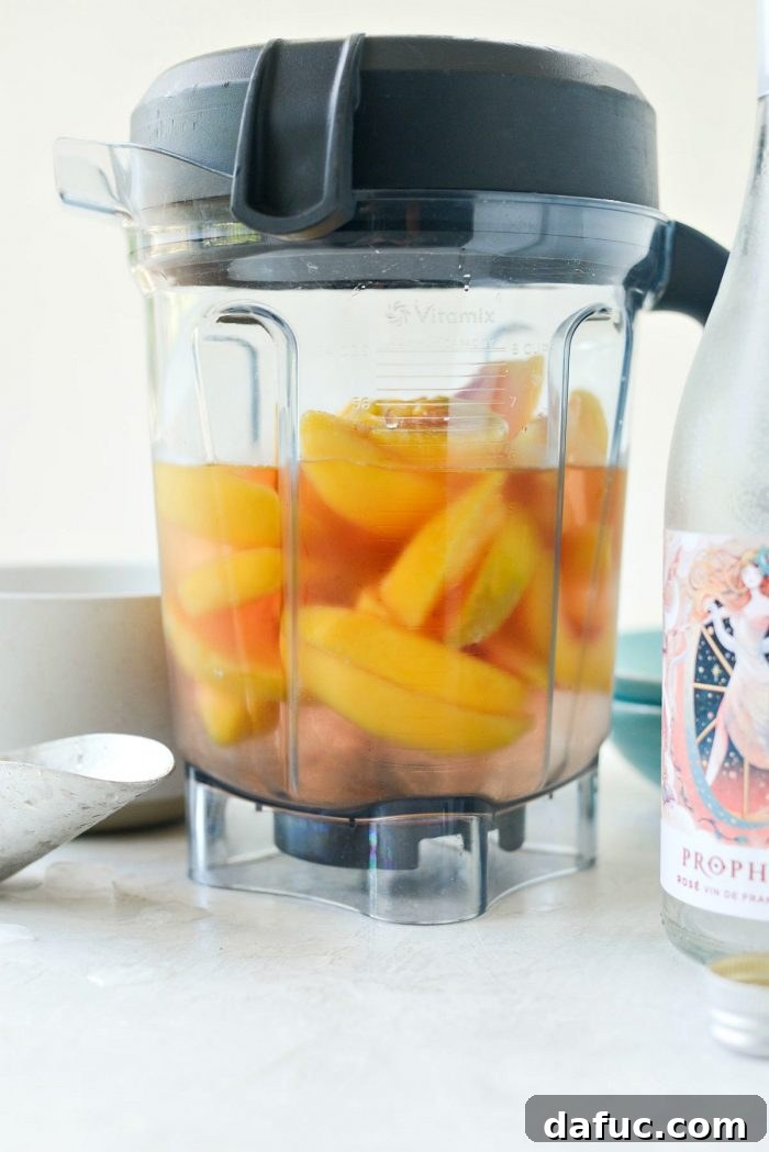 Blushing Peach Dream 9 Blending the Peach Frosé ingredients until smooth.