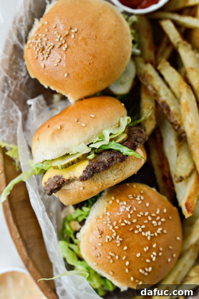 Mac Mini Bites 20 Another appealing view of a Mini Mac Slider with perfectly toasted bun and visible layers.