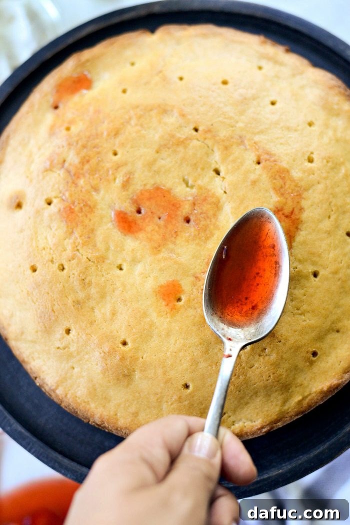 Fresh Strawberry Shortcake 20 Cooled pound cake layer with holes poked in the top for absorbing strawberry juices.