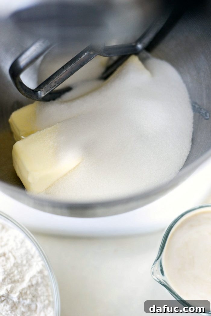 Fresh Strawberry Shortcake 7 Vanilla extract being added to buttermilk for the pound cake recipe.