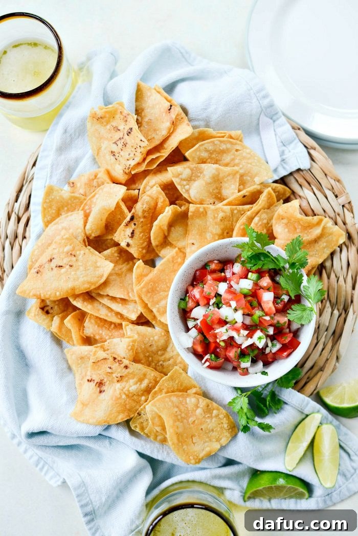 Easy Fresh Salsa 9 A mixing bowl of freshly tossed Pico de Gallo, showcasing the beautiful colors and chunky texture. Ready to be served. #toss #fresh_salsa #homemade