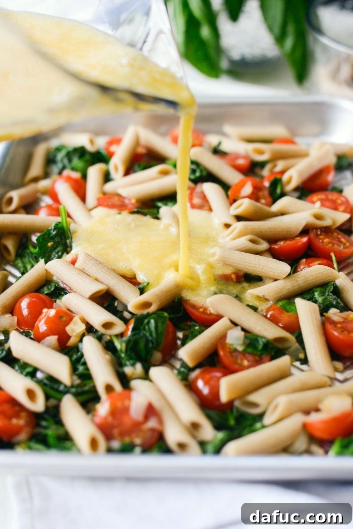Mediterranean Sheet Pan Pasta Frittata 11 Sheet pan frittata baking in the oven.