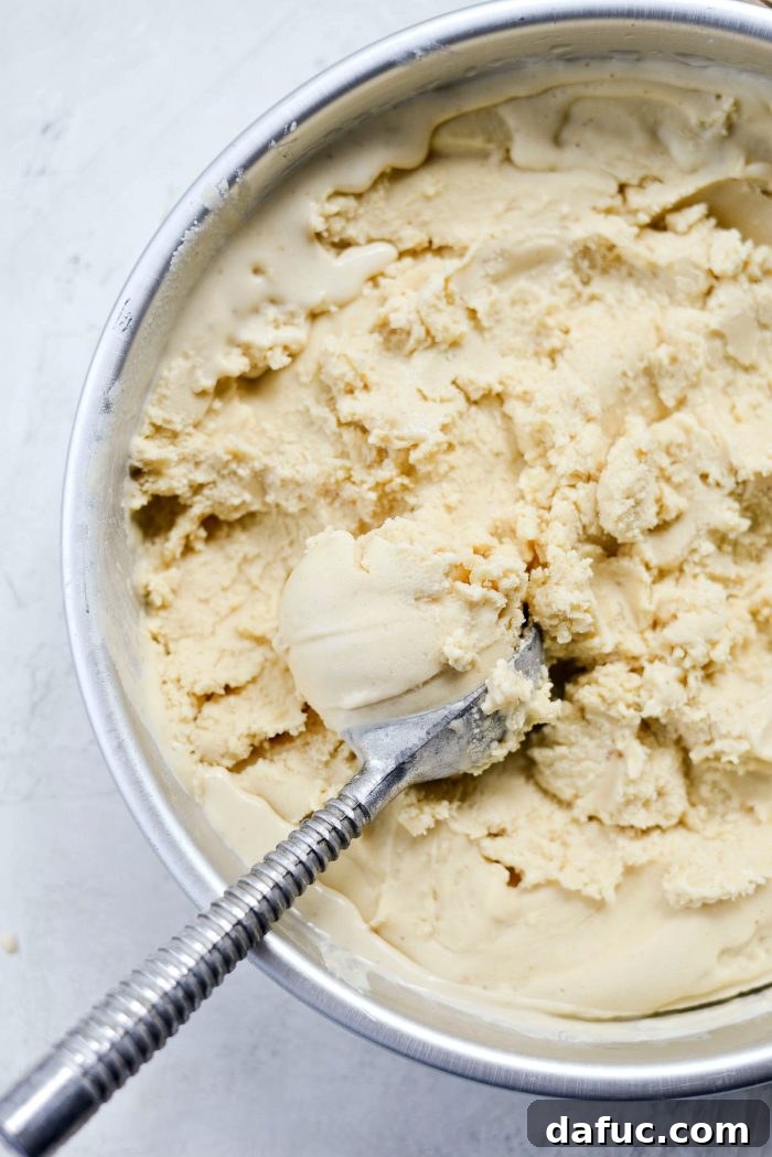 Golden Brown Butter Indulgence 2 Rich and creamy homemade Brown Butter Ice Cream in a bowl, topped with a sprinkle of sea salt.