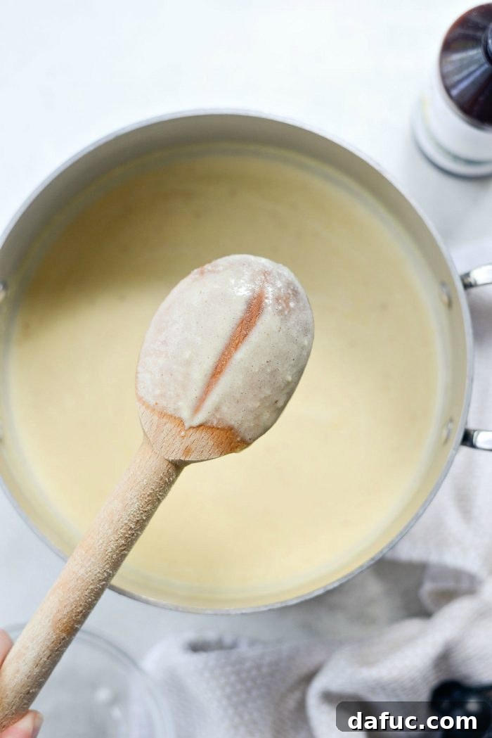 Golden Brown Butter Indulgence 13 Heating the ice cream base in a saucepan until it thickens.