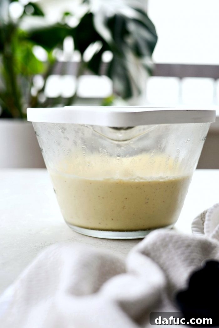 Golden Brown Butter Indulgence 17 The smooth, strained ice cream base in a bowl, ready for chilling.