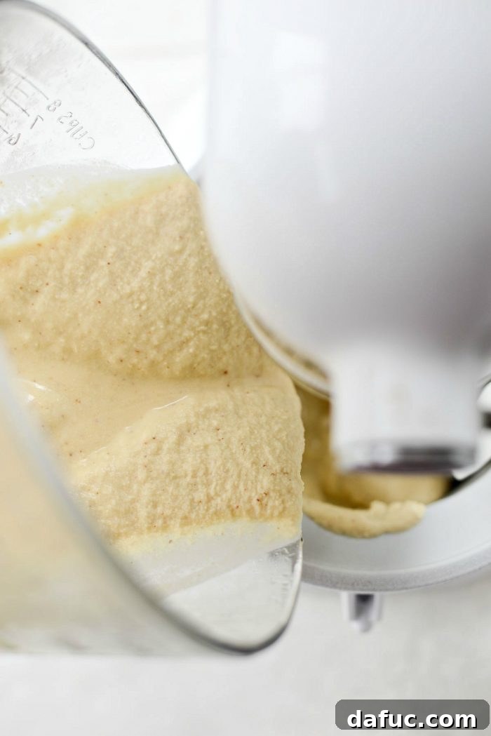 Golden Brown Butter Indulgence 19 Pouring the chilled ice cream base into an ice cream maker.