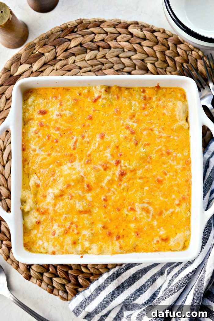 Delicious Layers of Cheese on Top of Mac and Cheese Before Baking