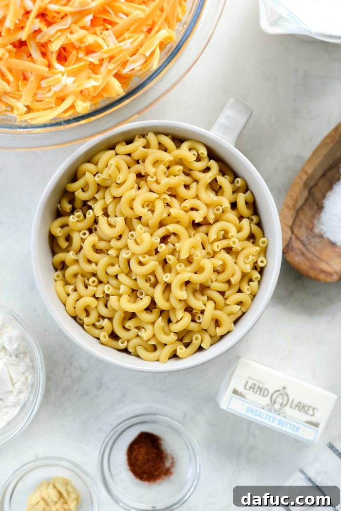 Mixing Freshly Grated Cheddar and Cheddar Jack Cheese for Mac and Cheese