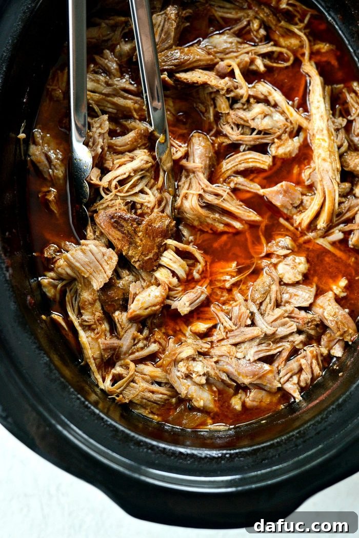 Shredding pork and skimming fat from the sauce