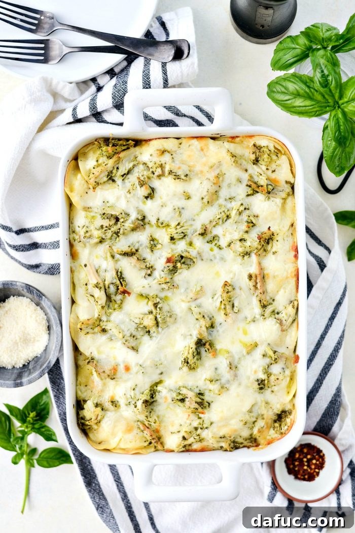 Pesto Chicken Ravioli Lasagna Bake 15 Golden brown and bubbly Pesto Chicken Ravioli Lasagna fresh from the oven