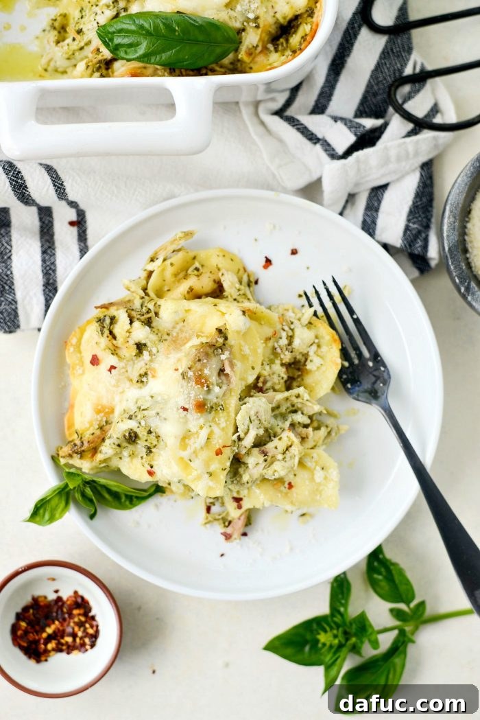 Pesto Chicken Ravioli Lasagna Bake 20 Enjoying a delicious plate of Pesto Chicken Ravioli Lasagna