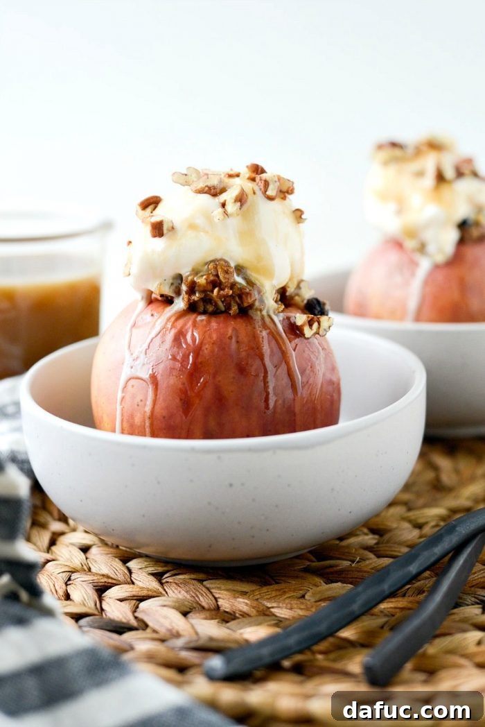Uncovered baked apples with golden cinnamon oat crumble