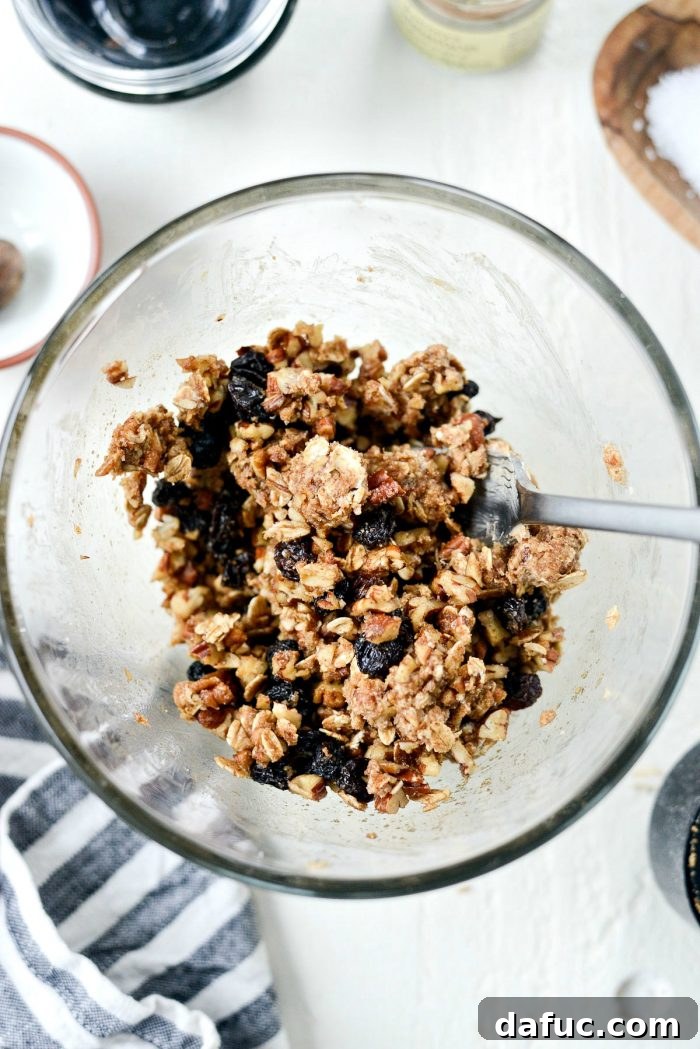 Mixing butter, sugar, oats, cinnamon, nutmeg, and vanilla for apple filling