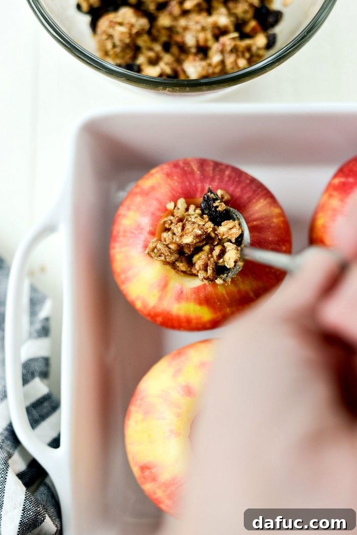 Adding pecans and raisins to the oat crumble filling for baked apples