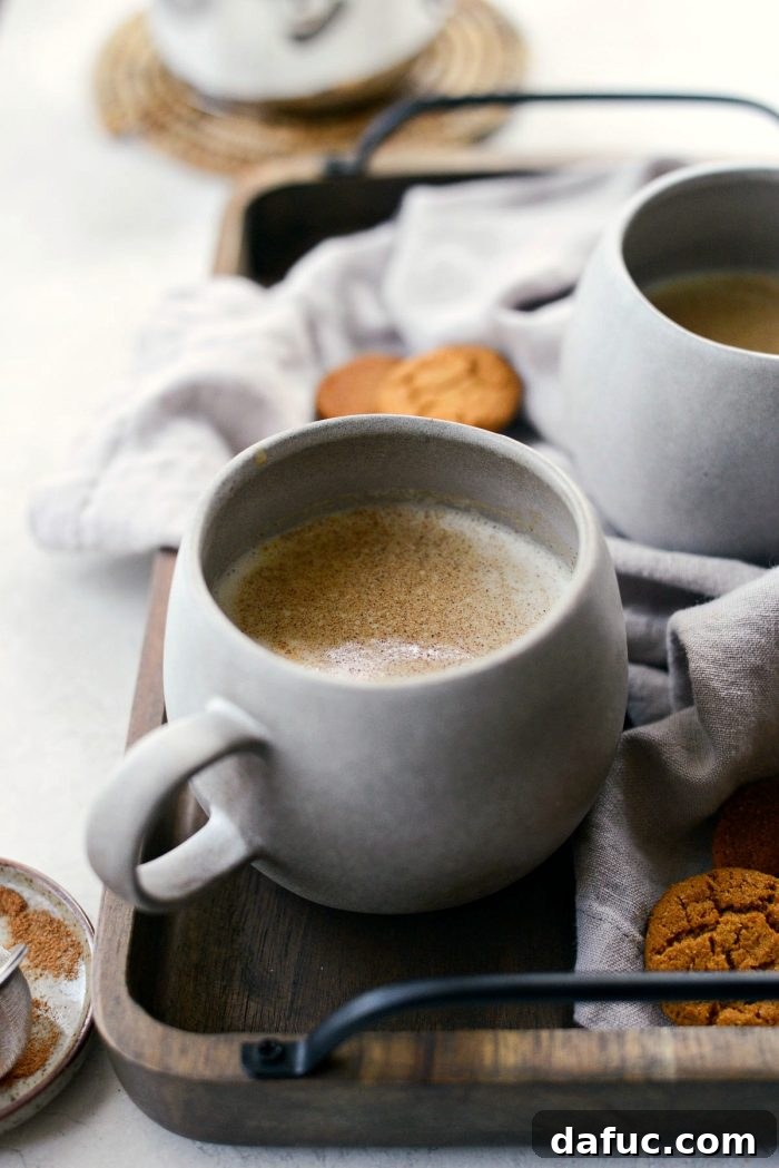 Cozy Pumpkin Chai Dream 17 Pumpkin Spice Chai Latte artfully presented with frothed milk