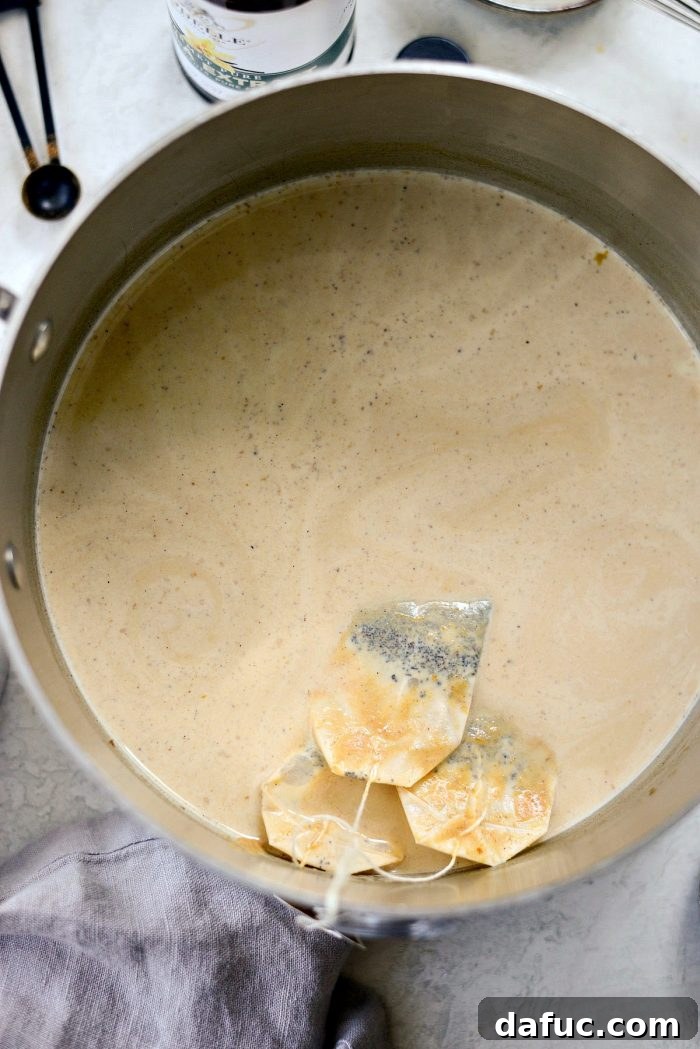 Cozy Pumpkin Chai Dream 9 Chai tea bags steeping in hot pumpkin spice milk mixture