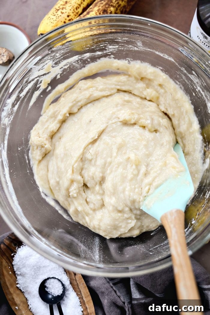Golden Maple Bourbon Banana Pudding Cake 13 Combining wet and dry ingredients for banana cake batter