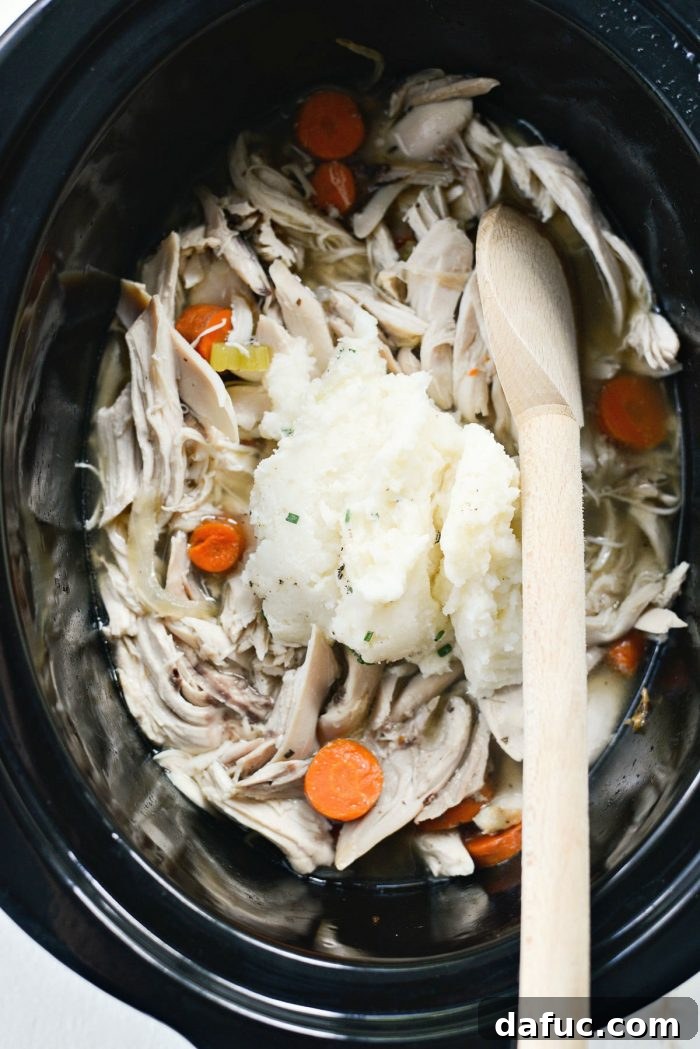 Mashed potatoes mixed into chicken and vegetables