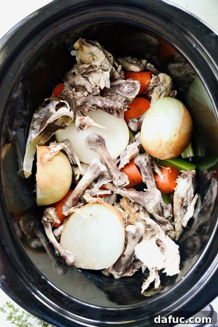 Deeply Flavored Slow Cooker Chicken Broth 5 Preparing ingredients for slow cooker chicken stock