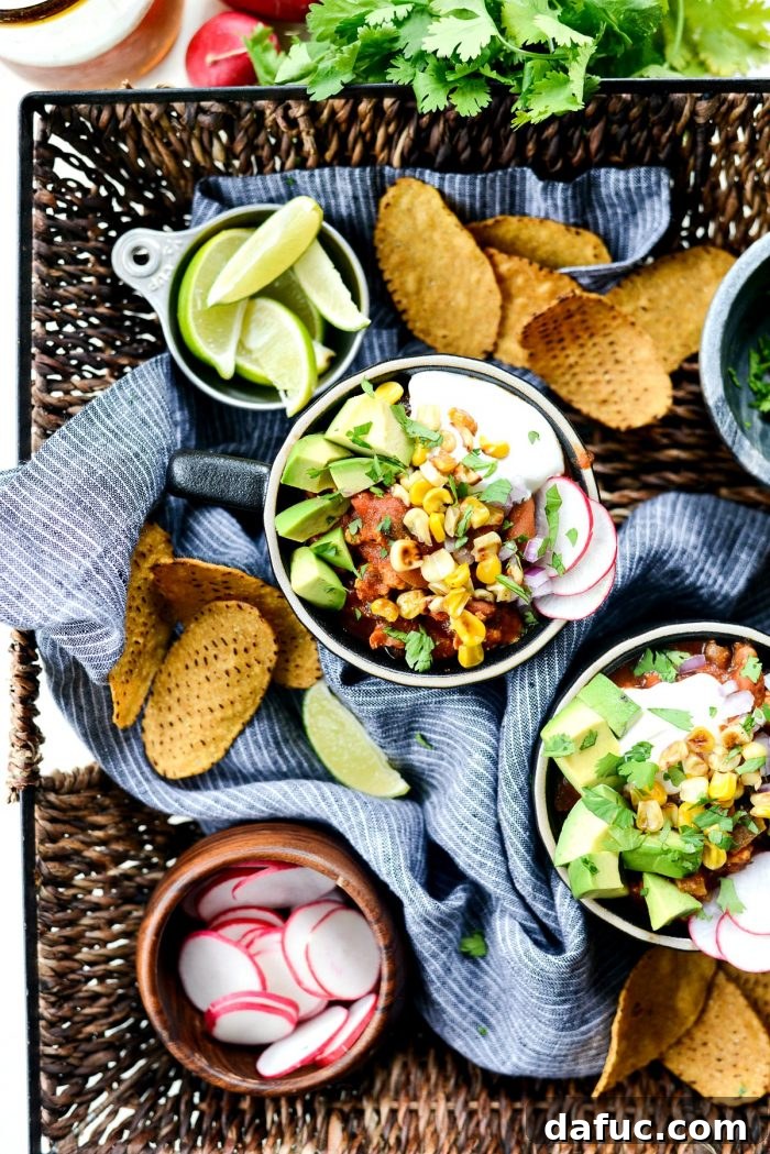 Serving Southwest Three Bean Chicken Chili with a side of sweet potato tortilla chips