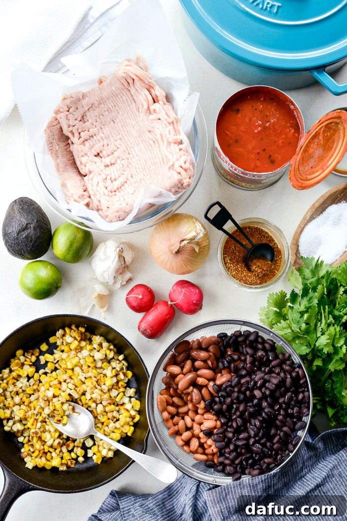 Colorful ingredients ready for Southwest Three Bean Chicken Chili preparation