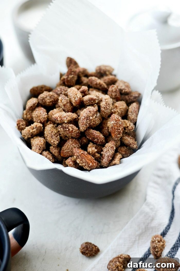 Irresistible Cinnamon Sugar Almonds 3 Close-up shot of golden-brown cinnamon sugar almonds, highlighting their crunchy coating and tempting aroma.
