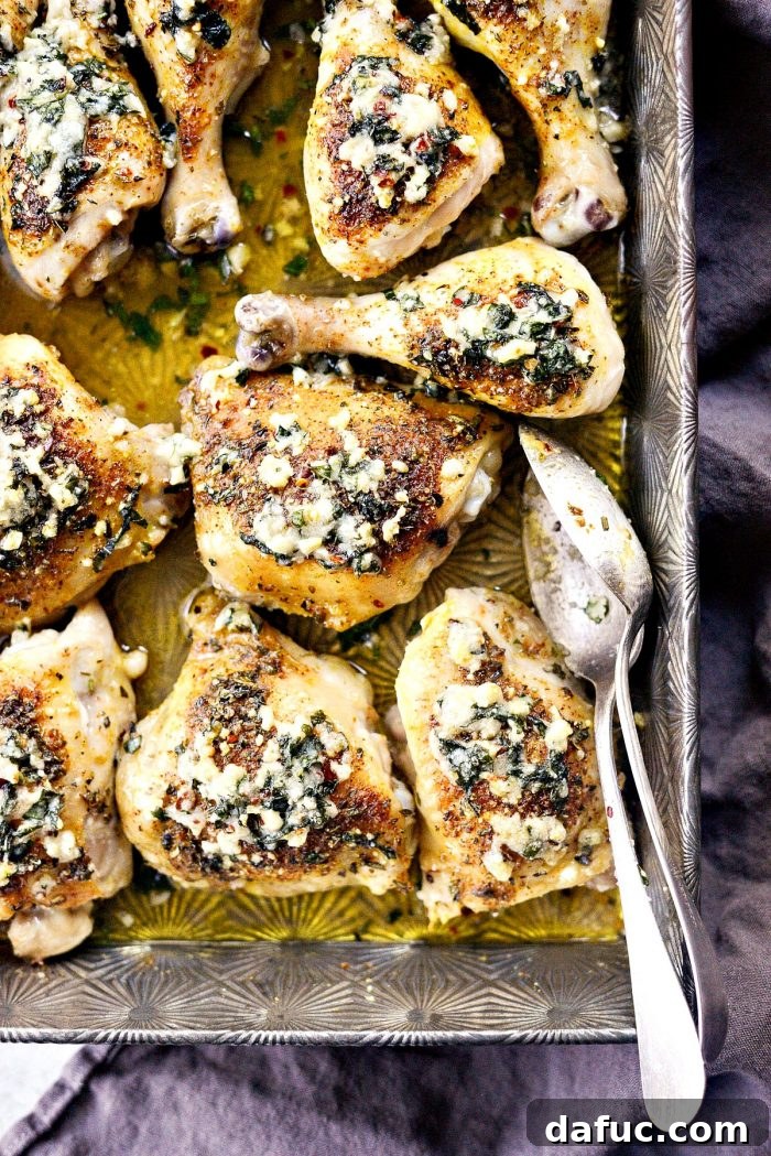 Crispy Garlic Parmesan Baked Chicken 2 Delicious Parmesan Garlic Baked Chicken with crispy skin and herbs, perfect for an easy family dinner. #parmesan #garlic #bakedchicken #easyrecipe #simplyscratch #dinnerideas #homemadechicken
