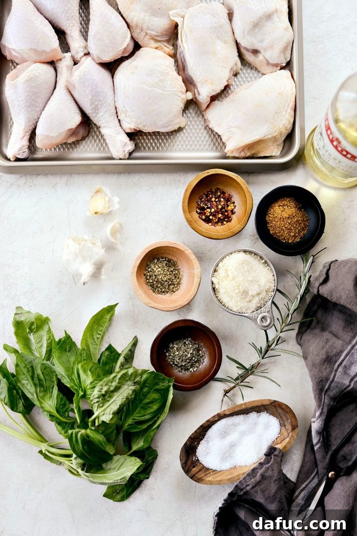 Crispy Garlic Parmesan Baked Chicken 3 Close-up of baked chicken thighs and drumsticks, ready for the Parmesan garlic topping. Perfect for a cozy dinner. #bakedchickenthighs #chickenrecipe #comfortfood #homemade