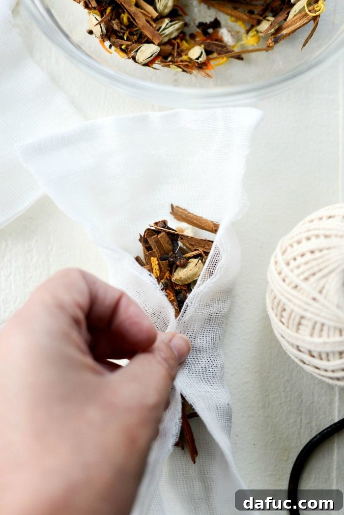Handcrafted Mulling Spice Sachets 11 Placing prepared mulling spices onto cheesecloth squares