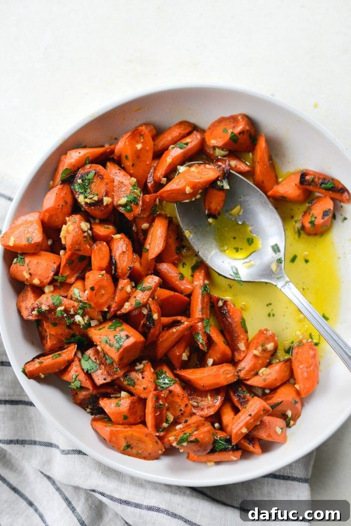 A final overhead shot of the Garlic Butter Roasted Carrots in a serving dish, highlighting their vibrant appeal.
