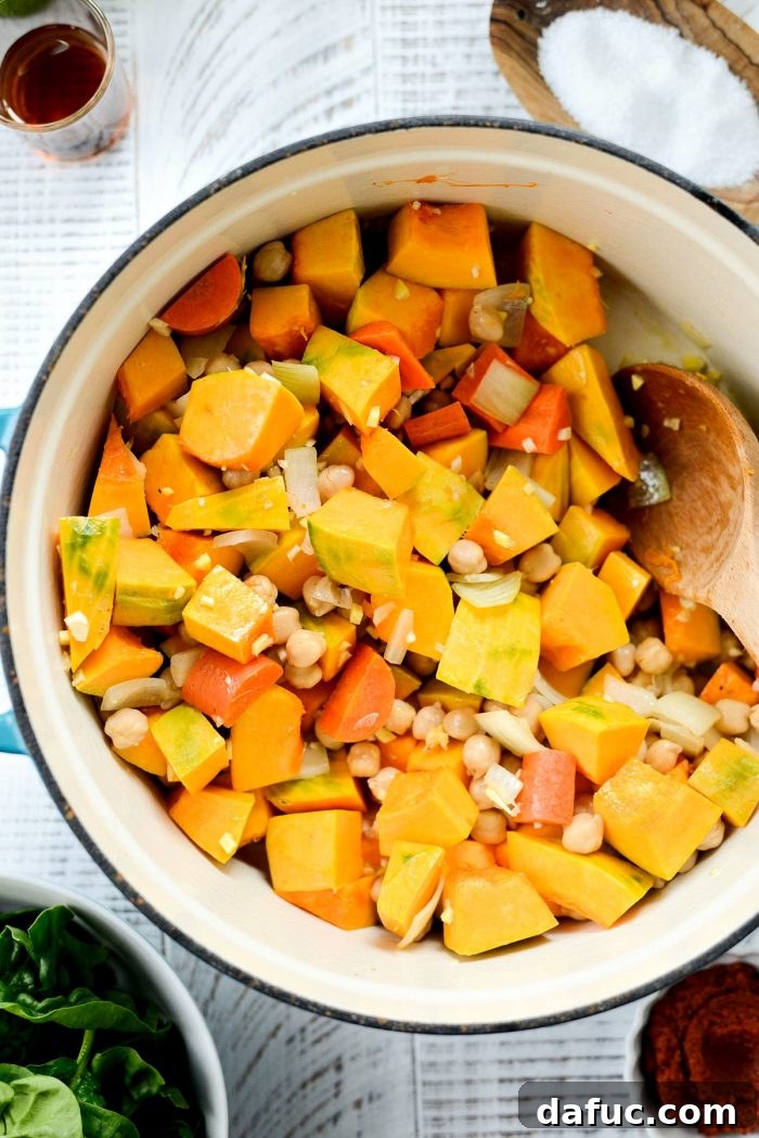 Creamy Kabocha Thai Red Curry 8 Chickpeas, squash, garlic, and ginger added to the pot