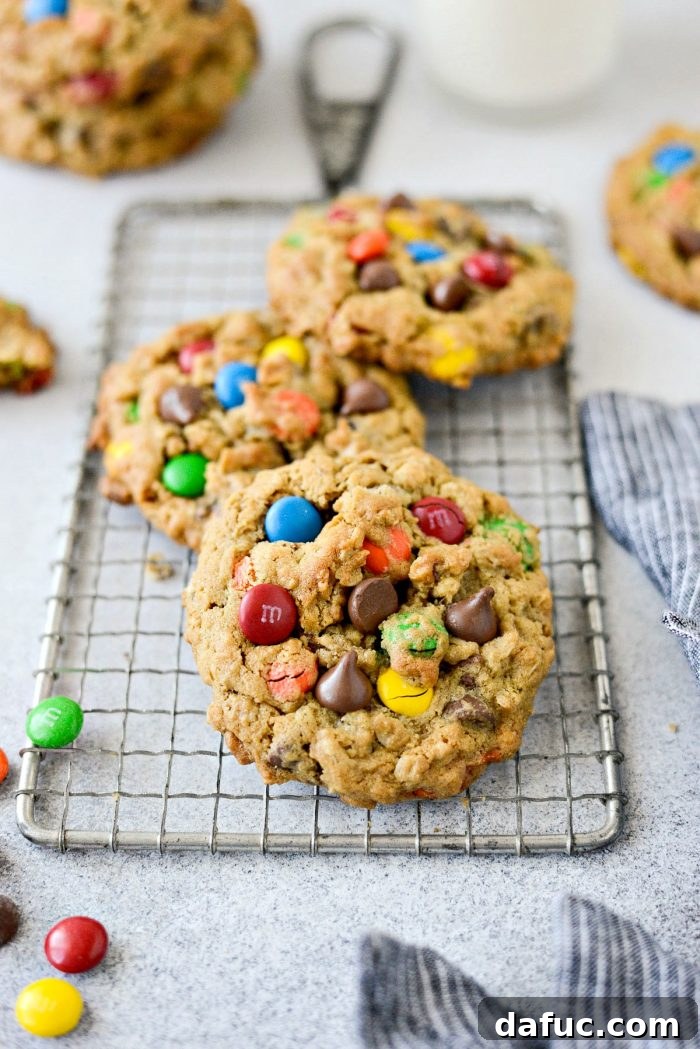 Close-up of a perfectly baked Monster Cookie with visible M&Ms and oats