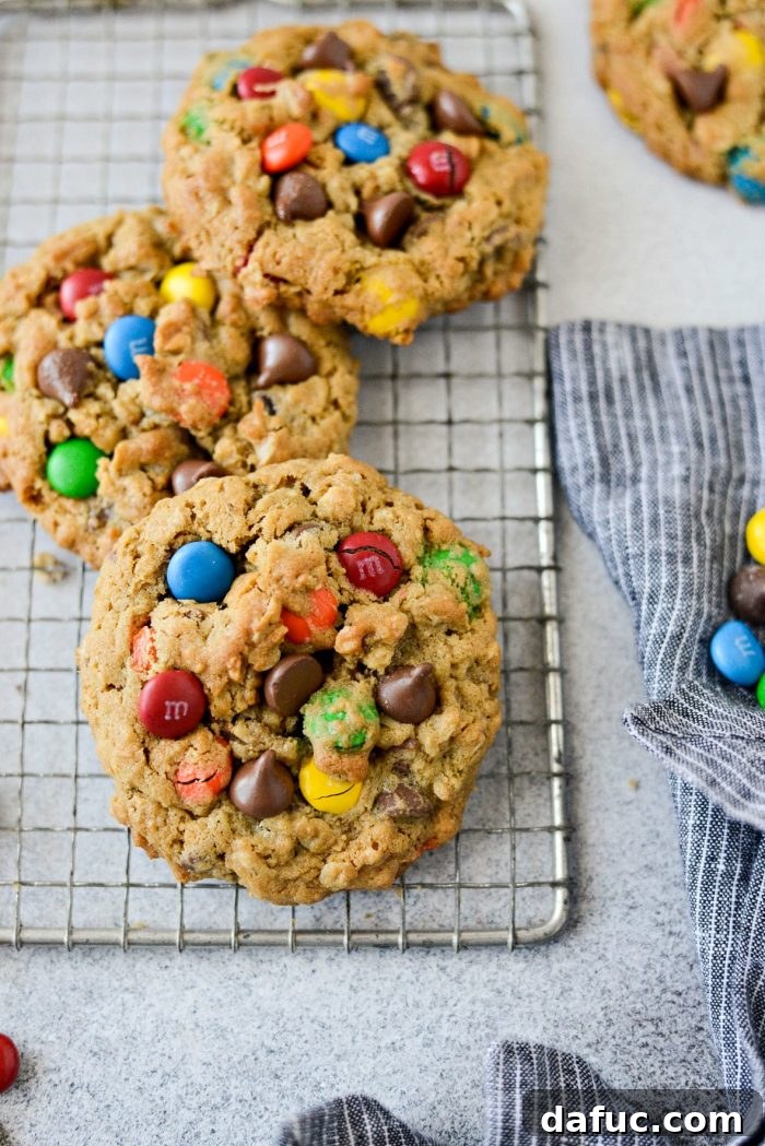 Stack of Monster Cookies showing their thick and chewy texture