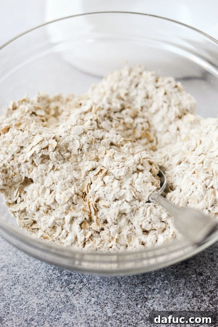 Stirring together the dry ingredients in a mixing bowl