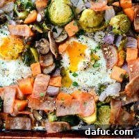 Sheet Pan Breakfast Hash with bacon, eggs, and roasted vegetables