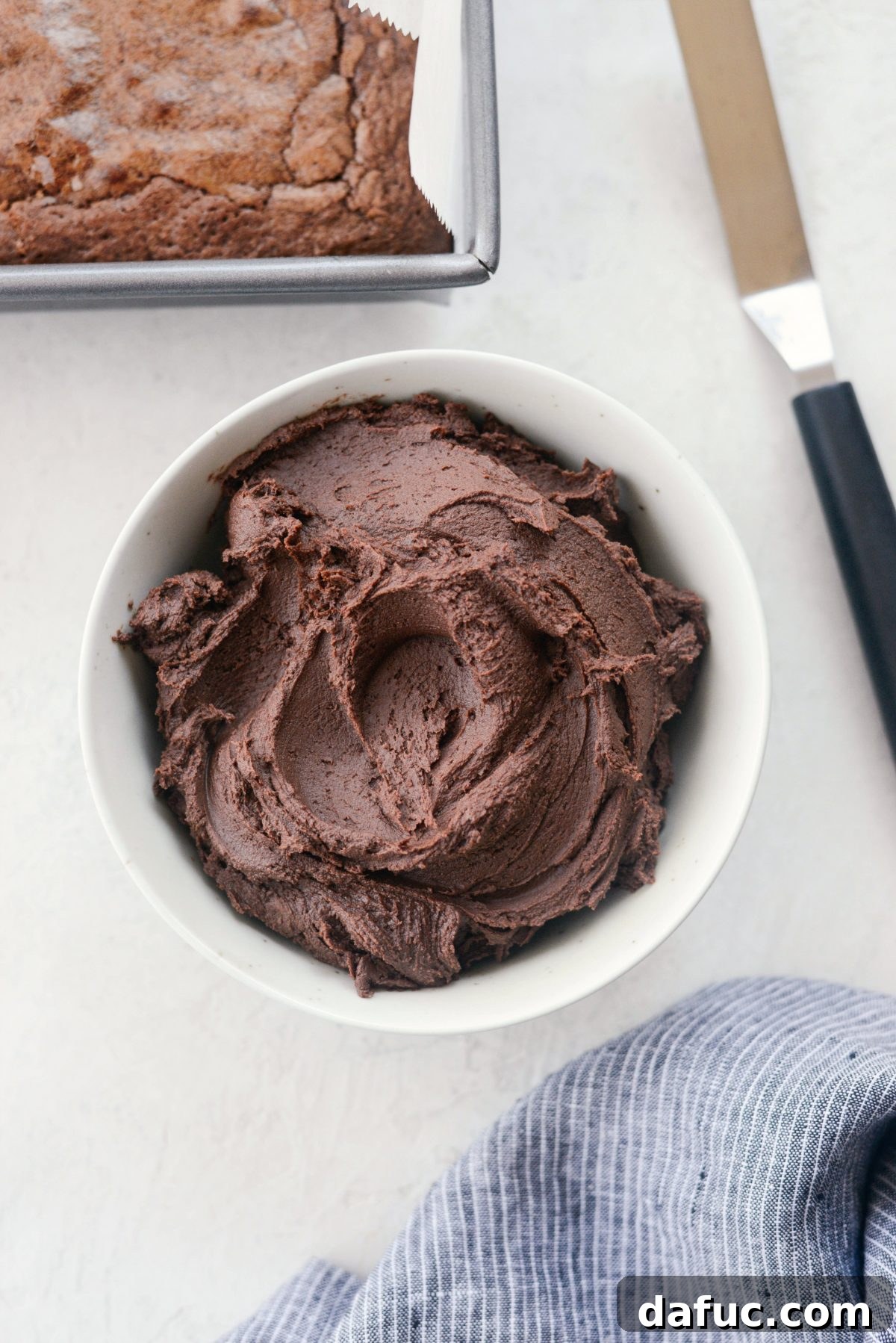 Silky Smooth Chocolate Frosting 15 A bowl of finished homemade chocolate frosting, rich and ready to serve.