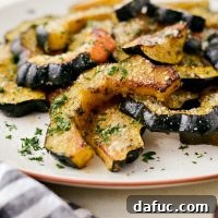 Parmesan Herb Roasted Acorn Squash - A perfect fall and holiday side dish recipe, easy to make for Thanksgiving or any menu.