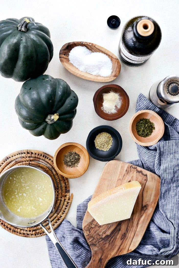 Herb Crusted Parmesan Acorn Squash 3 Sliced acorn squash tossed with butter, olive oil, and herbs for roasting.