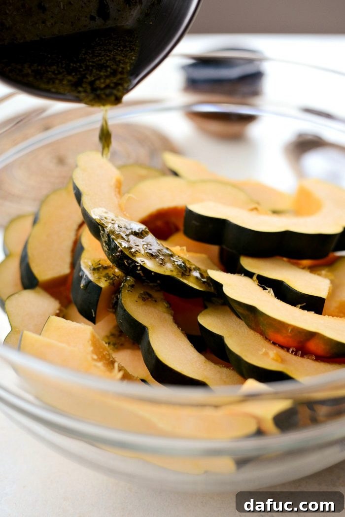 Melted butter and herbs whisked together for acorn squash coating.