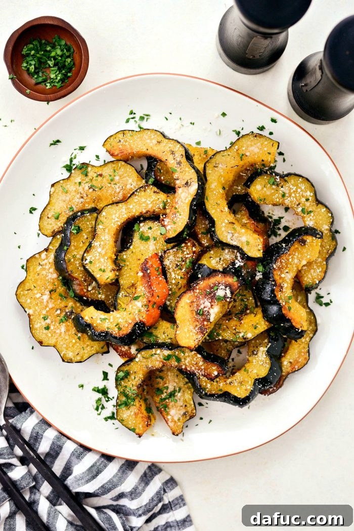 Herb Crusted Parmesan Acorn Squash 10 Parmesan Herb Roasted Acorn Squash finished with a sprinkle of fresh Parmesan and parsley.