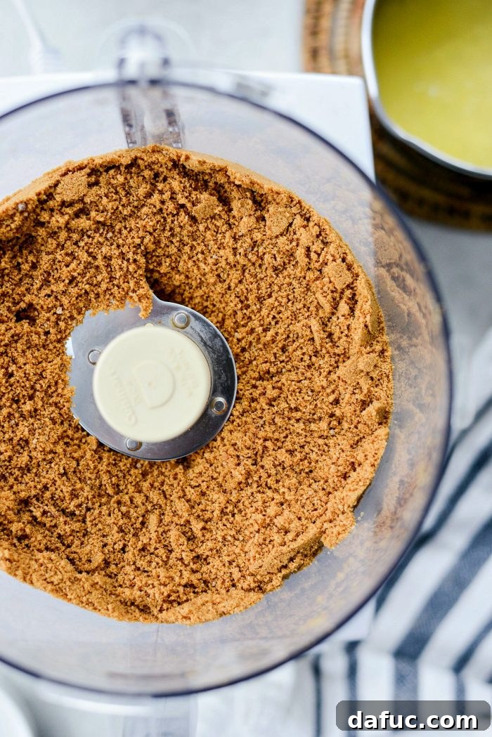 Dreamy No-Bake Pumpkin Cheesecake with a Gingersnap Crunch 5 Pumpkin Puree and Spices for a Flavorful Cheesecake Filling
